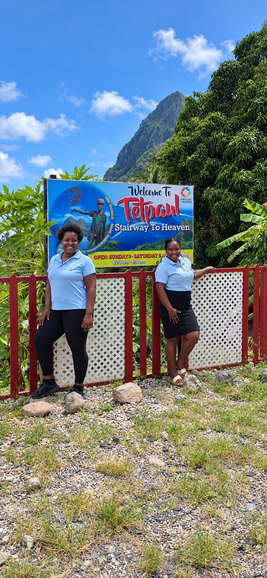 Two Tet Paul team members welcoming visitors at the Stairway to Heaven entrance